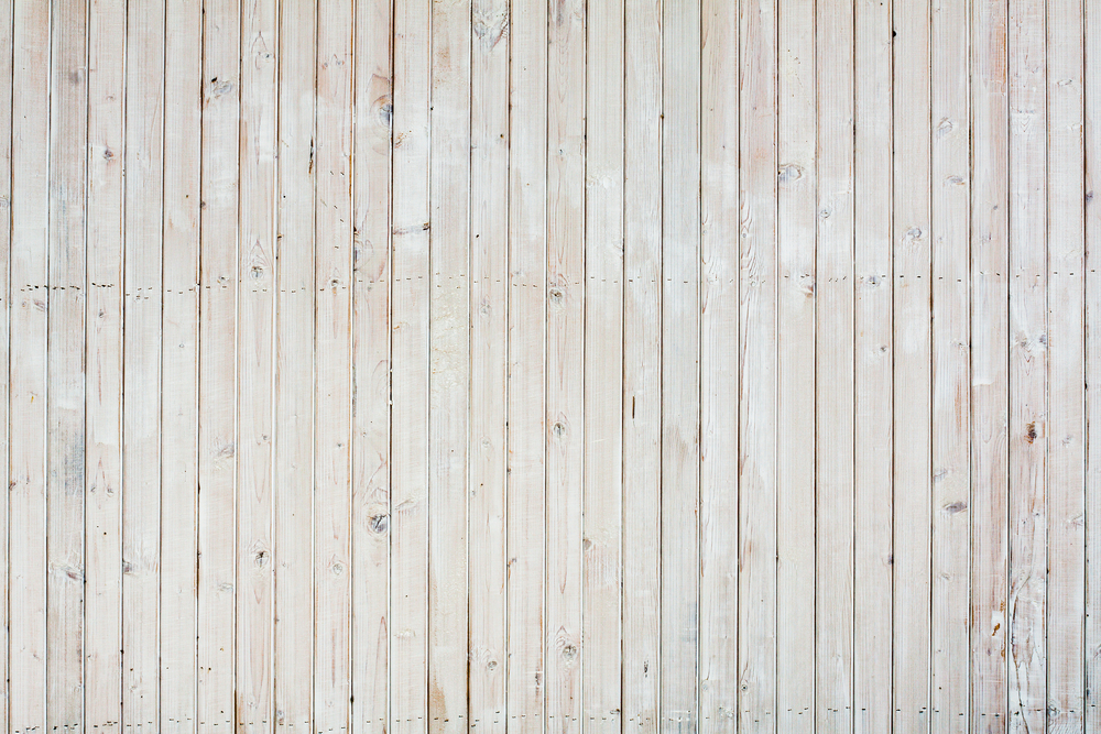 Pale, white pine wall.