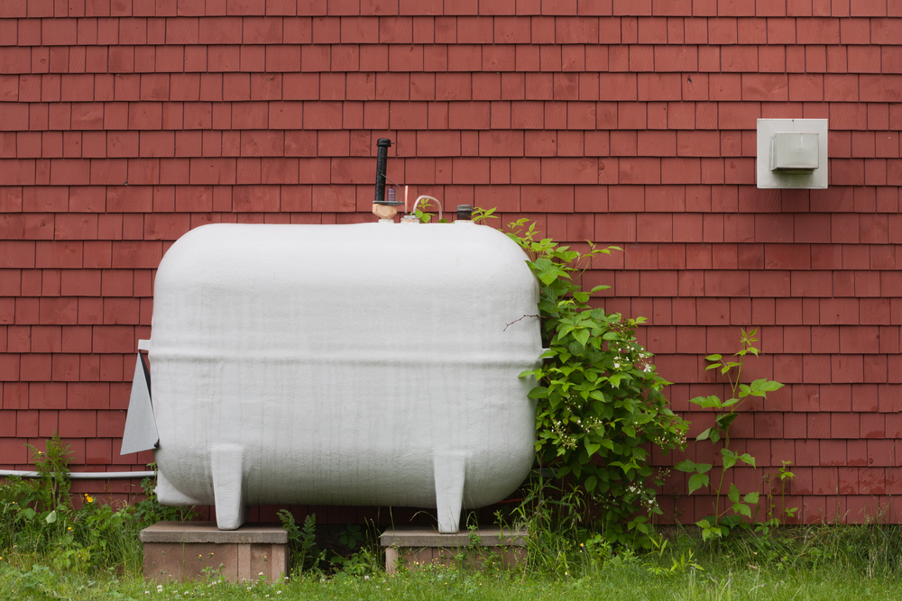 Heating fuel tank outside a house.