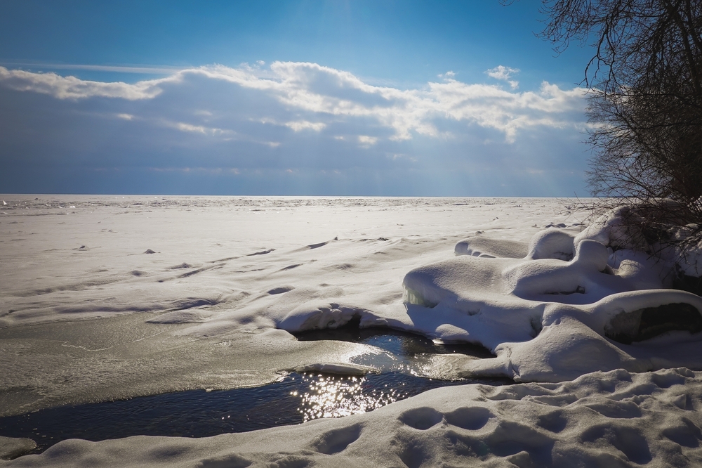 Frozen Lake Simcoe, Ontario, Canada on a sunny day.