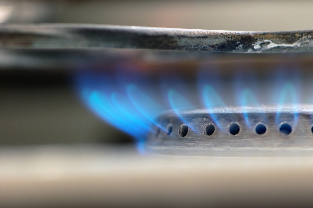 Burning gas stone with blue flame