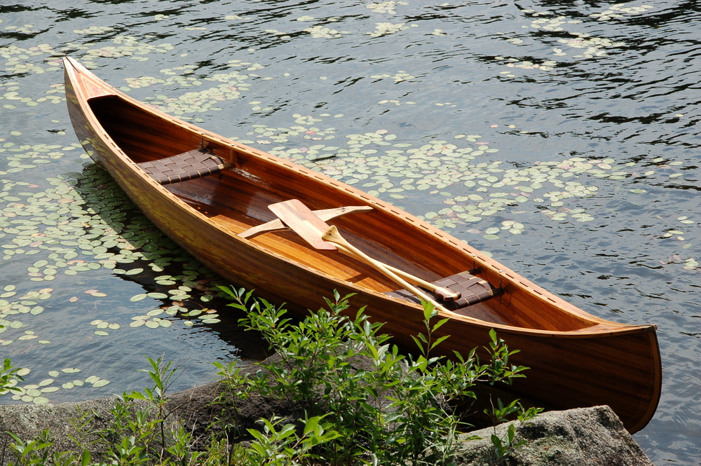 Cedar strip canoe in a lake