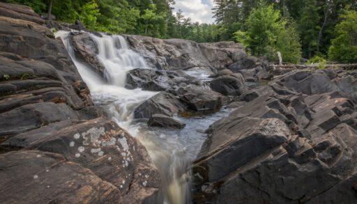 Side view of Wilson's Falls, Ontario on a cloudy day.