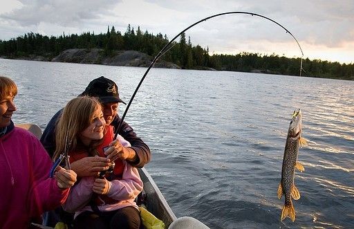 People fishing from boat