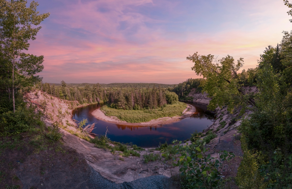 Big bend at Arrowhead Provincial Park during a magenta-coloured sunset.
