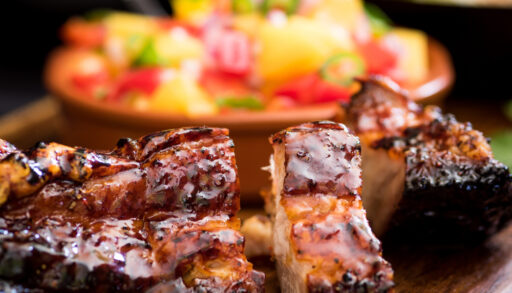 Close-up of grilled ribs with a jerk rub.