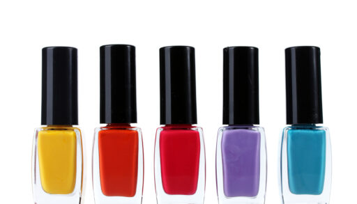 Different coloured bottles of nail polish.