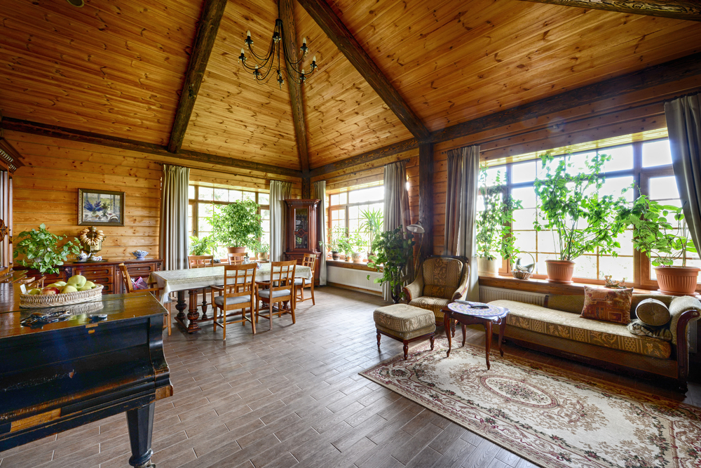 Wood-panelled interior of a living room.