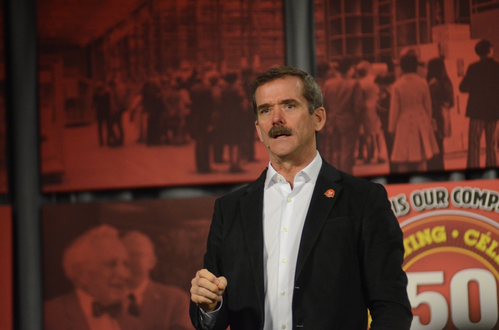 Chris Hadfield speaking at an event.