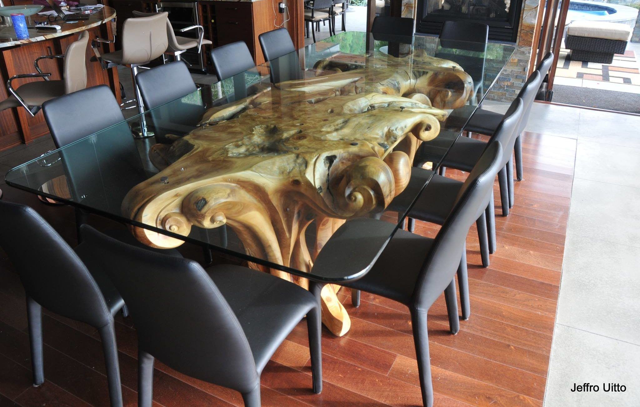 Dining room table made of intertwining tree stumps