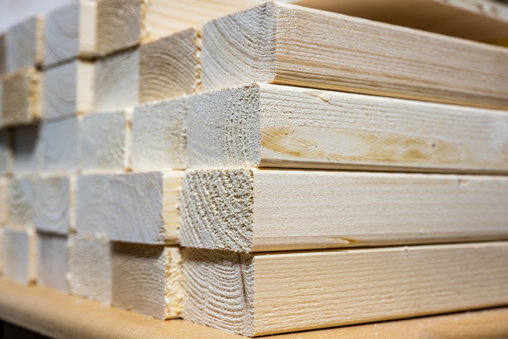 Close-up of a stack of lumber.