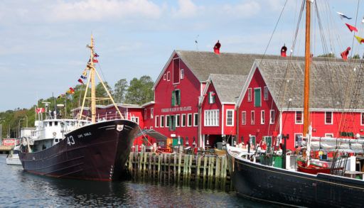 Red buildings along the Lunenberg harbour in Nova Scotia.