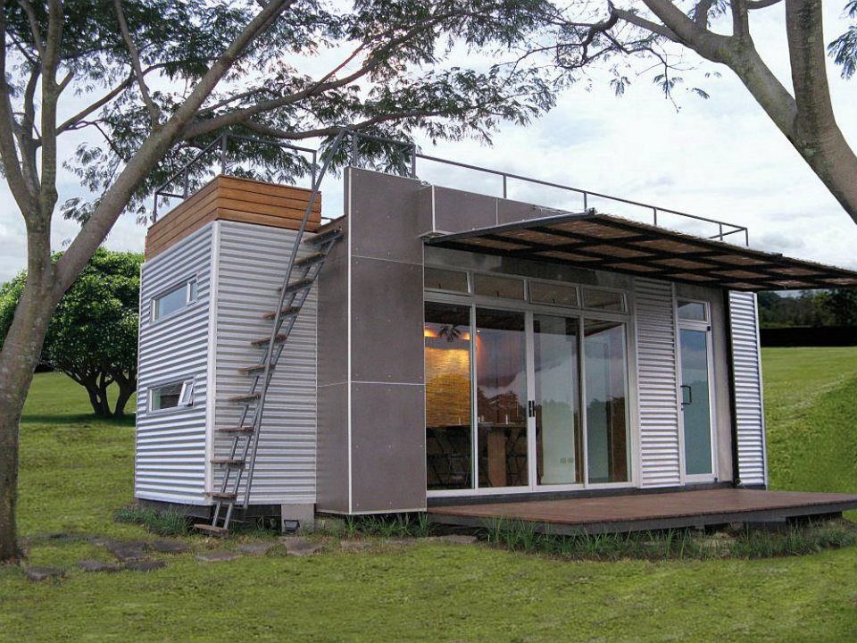 The front exterior of a tiny house made from a shipping container.