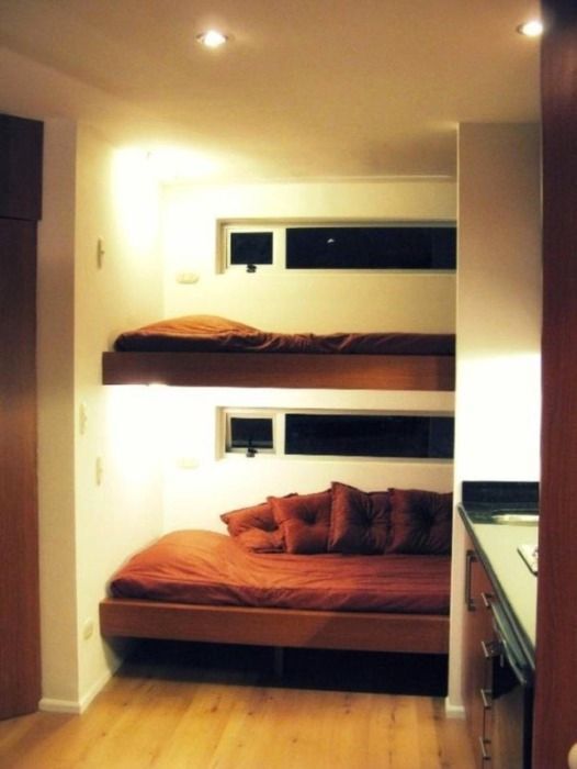 The bunk beds inside the shipping container tiny house.