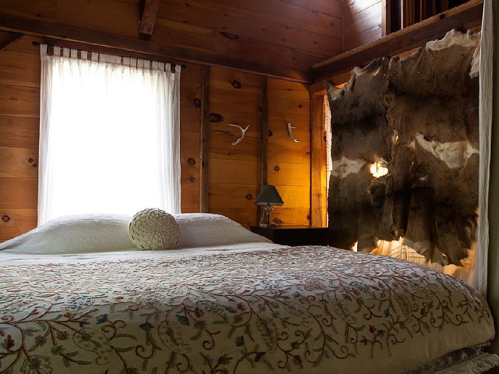 The kind-sized bed in the restored barn.