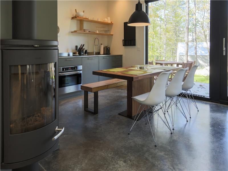 A kitchen with a gas fireplace