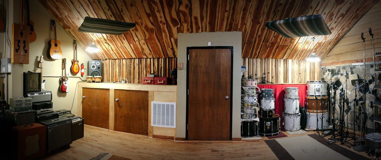 studio space with wood walls and ceilings