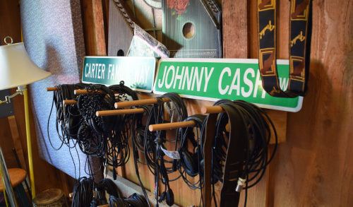 Headphones with Cash and Carter road signs