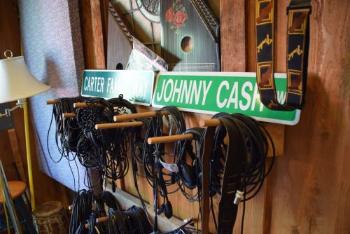 Headphones with Cash and Carter road signs