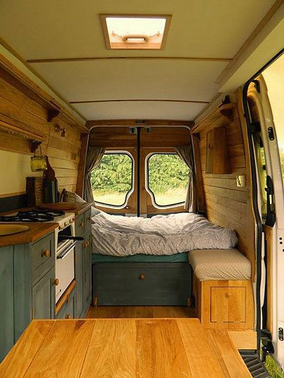 Van interior with bed, shelves