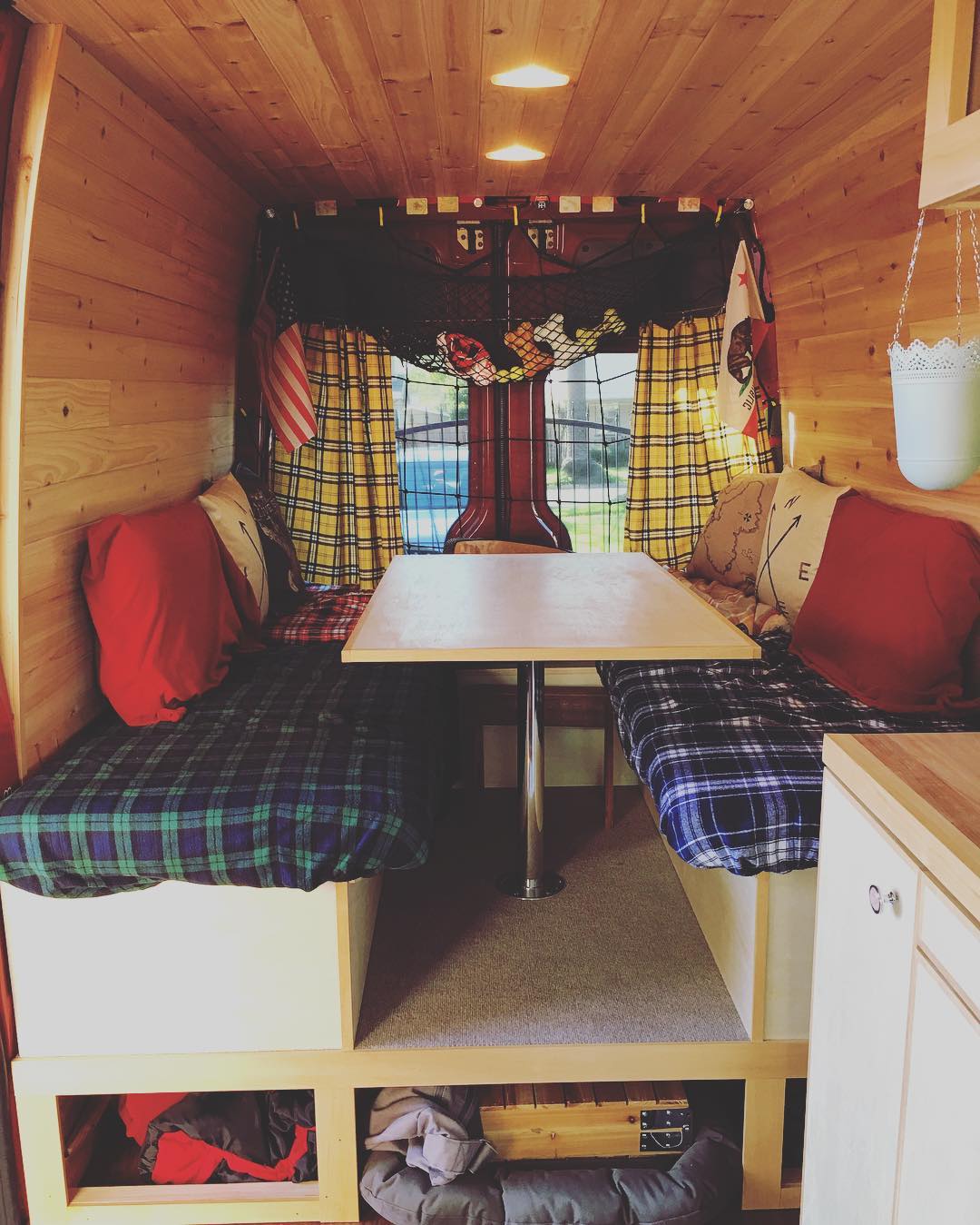 Van interior with table and benches