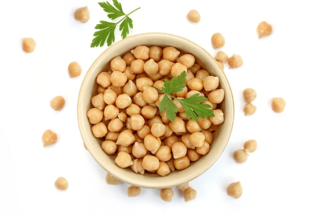 Ceramic bowl filled with chickpeas.