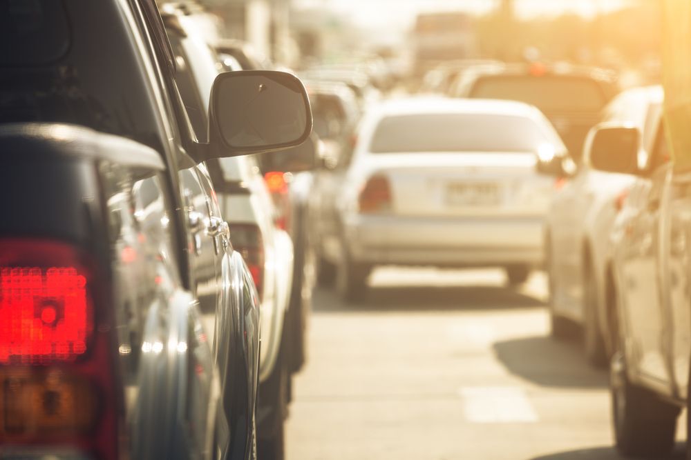 Close-up of cars lined up in traffic.