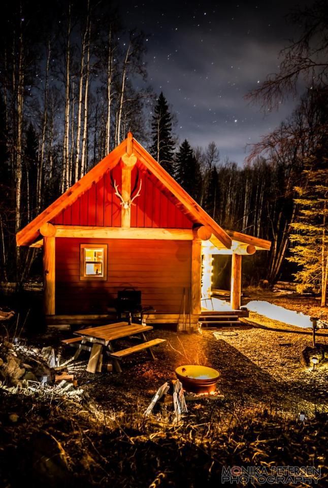 Exterior view of cabin at night