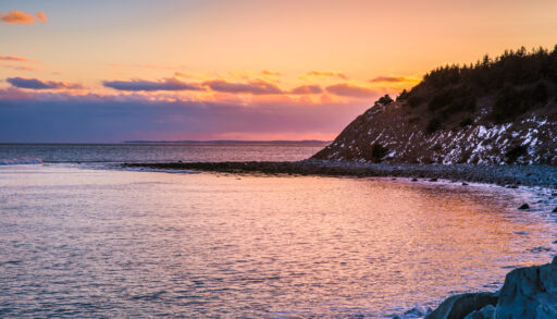 Atlantic ocean off the coast of Halifax, Nova Scotia, Canada at sunset.
