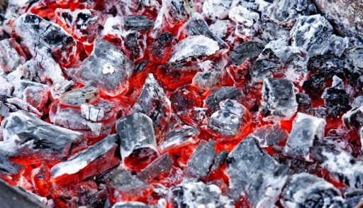 Heated pit used for pit cooking.