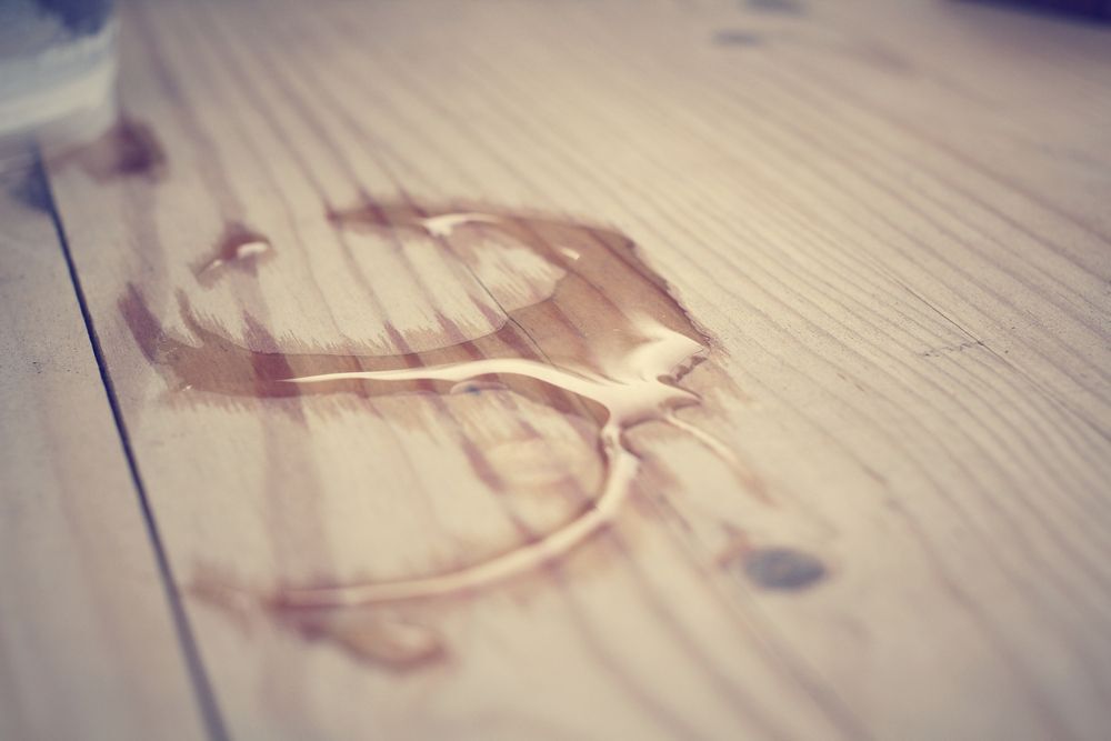 Water ring on wooden table.