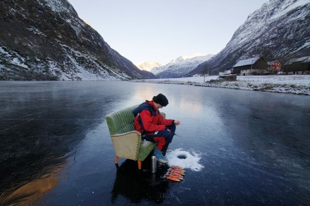 Person ice fishing on a couch