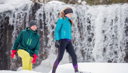 Couple snowshoeing in the winter.
