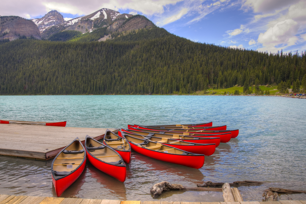 Red canoes on Lake Louise, Banff National Park, Alberta, Canada.