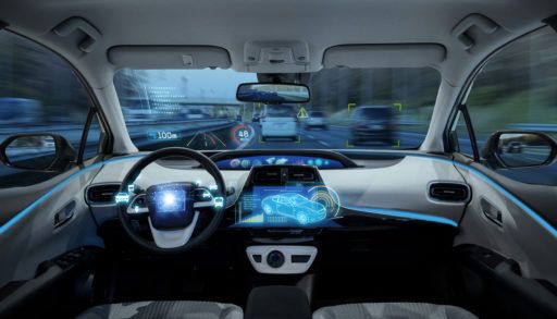 High tech self-driving-car with blue LED displays on the dashboard.