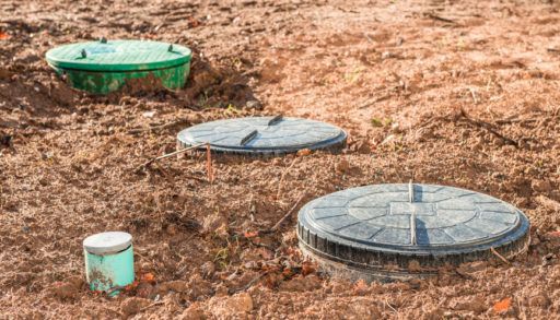 Septic tank lids in ground