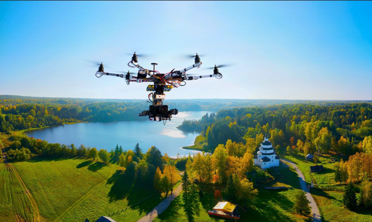 drone-photographing-lake-in-the-summer