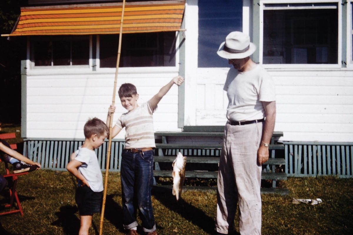 Boys-and-dad-with-caught-fish-1950s-bamboo-fishing-rod