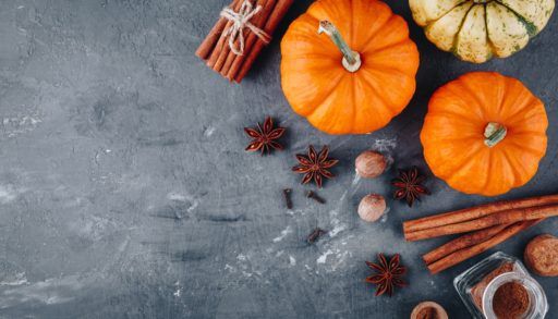 An-array-of-pumpkins-and-seasonings-that-make-up-pumpkin-pie-spice