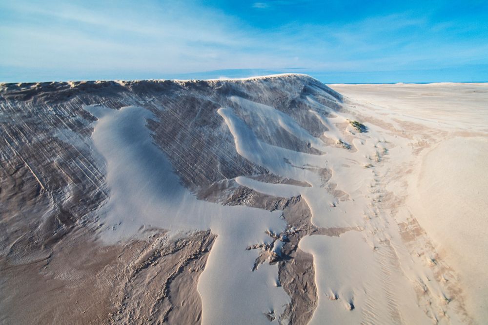 An aerial view of sand dunes