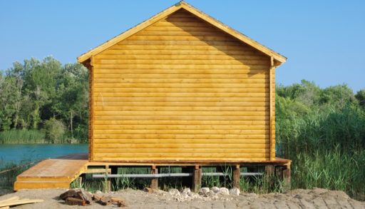 prefab-home-on-land-near-lake-in-country