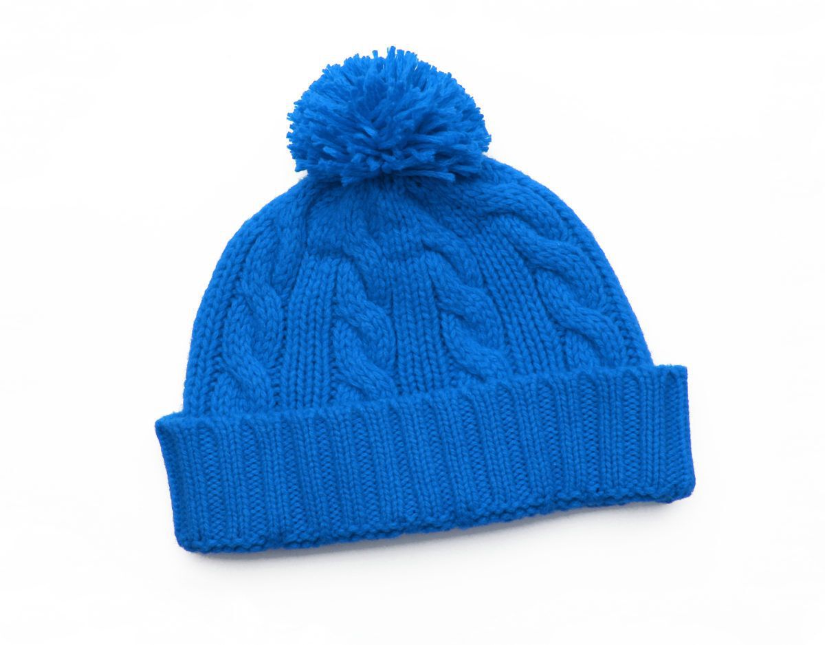 blue knit toque on white background