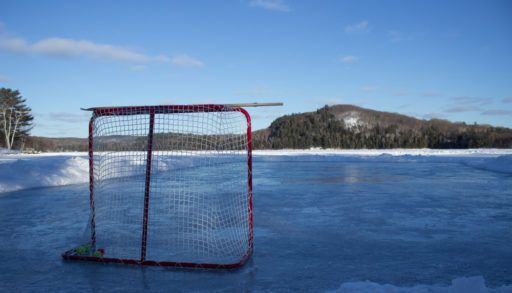 Lake hockey rink at sunset