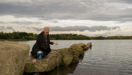 woman scattering ashes in ontario