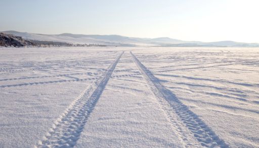 tire-tracks-on-ice-on-lake