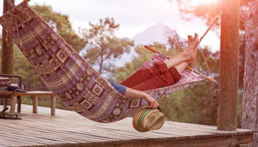 person-laying-in-a-hammock