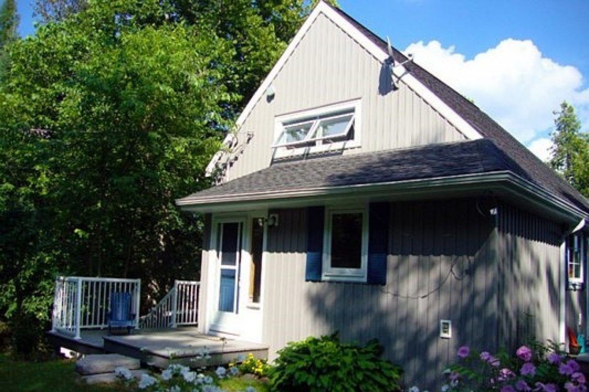 The Minden cottage overlooking a lake.