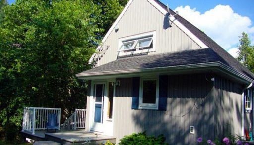 The Minden cottage overlooking a lake.
