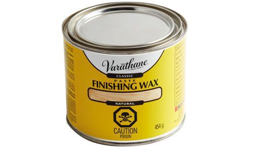 finishing wax to use on a stuck wooden drawer on white background