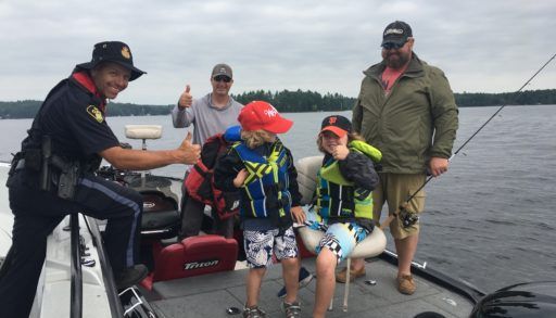 Cottagers after a successful boating courtesy check with OPP