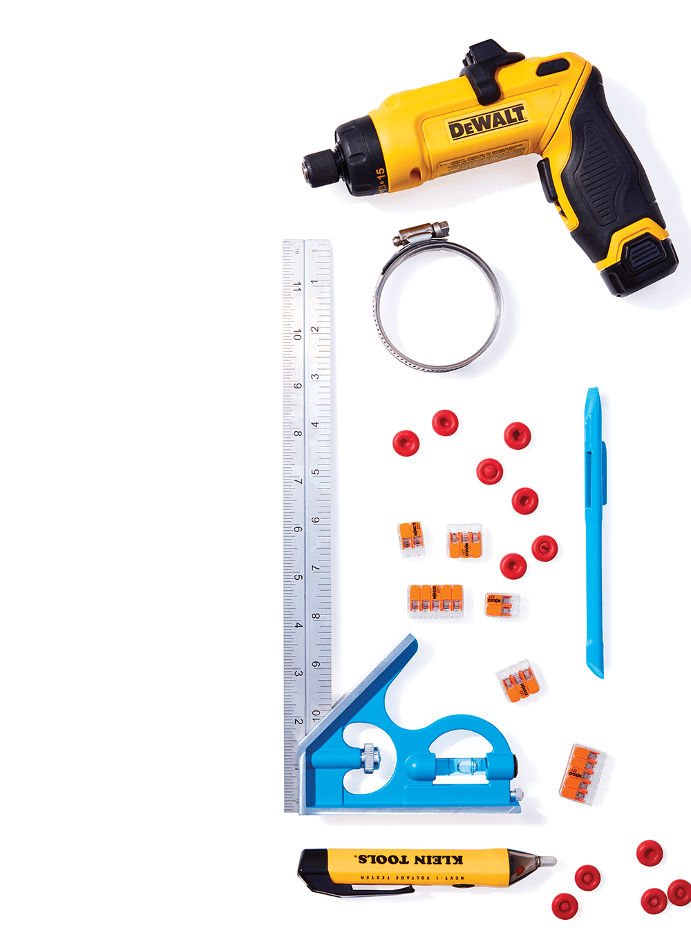 collection of workshop tools and accessories on a white background